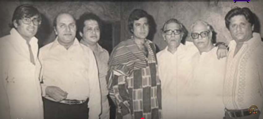 Vintage photo of Rajesh Khanna surrounded by fans and film team members during his peak fame era